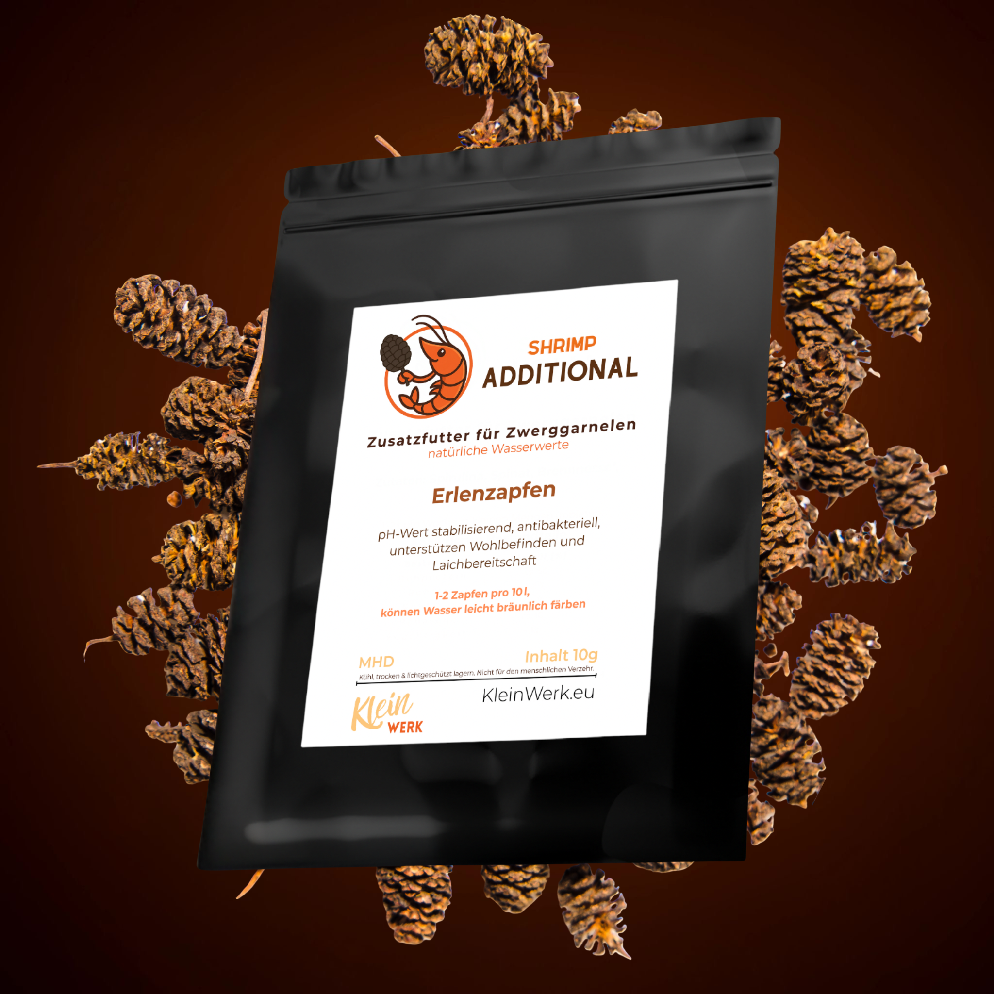 Schwarze Verpackung mit Erlenzapfen-Zusatzfutteretikett für Zwerggarnelen, 30g Inhalt.